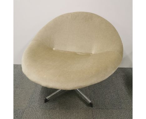 A vintage green upholstered button tub chair on a revolving chrome base in the style of a Pierre Paulin globe chair, H. 60cm.