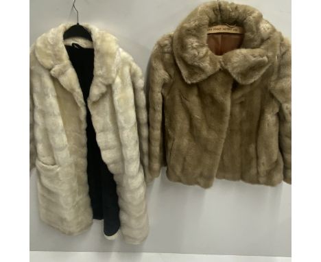 Two vintage faux fur jackets.