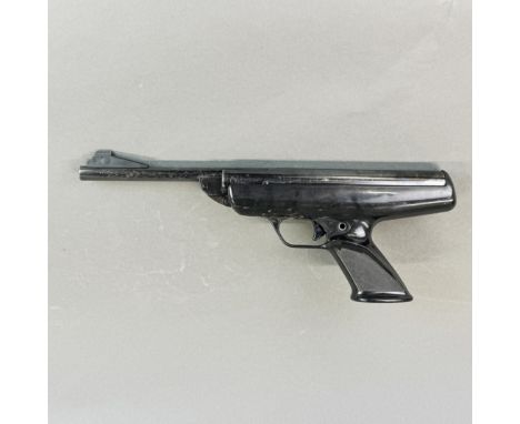 A vintage BSA Scorpion air pistol. Mechanism separated.