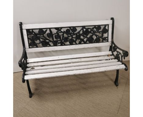 A vintage cast iron and wooden garden bench, L. 128cm H. 80cm.
