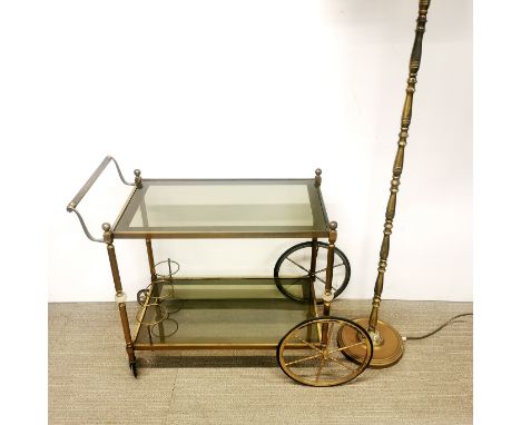 A vintage brass and glass drinks trolley together with a gilt metal standard lamp, trolley 77 x 70 x 40cm.