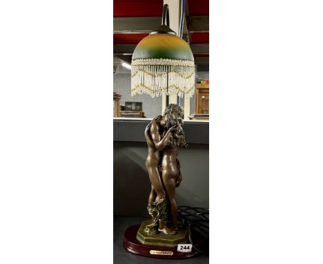 A cold cast figural table lamp and shade, H. 62cm.