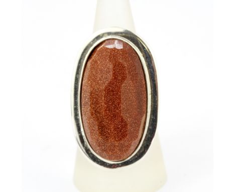 A large 925 silver and goldstone ring, (P.5).
