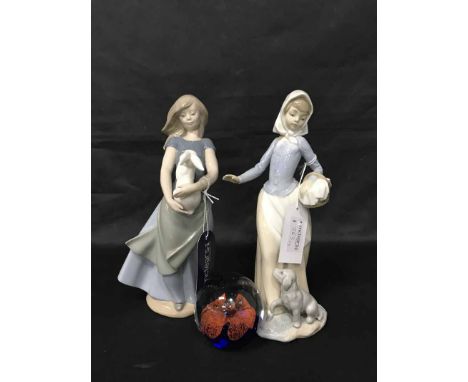 TWO NAO FIGURES OF YOUNG GIRLSalong with a glass paperweight