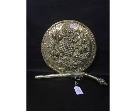 REPRODUCTION FLINTLOCK PISTOLalong with a beaten brass portrait of Francois de Salignac de la Mothe Fenelon and another brass