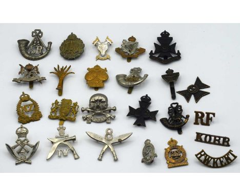 Quantity of 23 cap badges to include: Indian made "16th Queens lancers" by Bihari bros Aligarh, Queen Mary's Auxillery army c