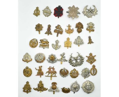 Quantity of 20th century British Military Cap Badges to include Canadian 48th Highlanders, Guards Machine Gun Regiment, Royal
