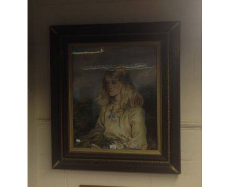 A pastel portrait of a young girl with cornflower in her hair, signed 'Jasper Brett, 1923'