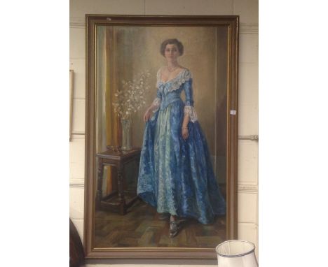 A full-length portrait of a young woman in blue fancy dress, standing by a stool on which rests a pistol, signed and dated 19