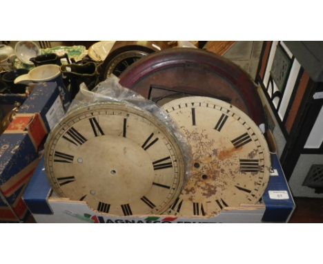 A collection of clock dials, a clock movement and a Victorian mantel clock in need of restoration