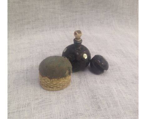 An ivory mounted pin-cushion and a carved mother-of-pearl inlaid scent flask