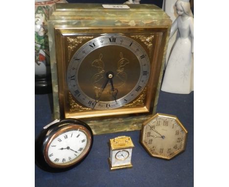 A mantel clock in onyx frame and others similar