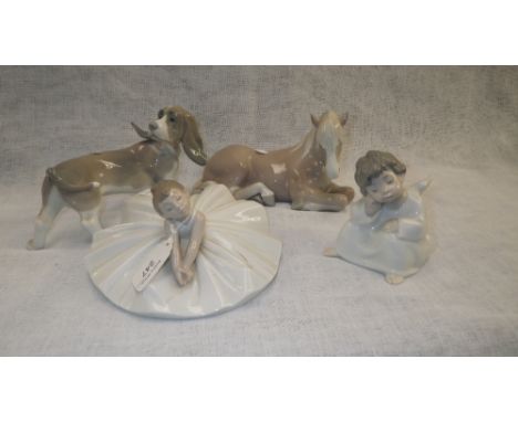 A Nao figure of a ballerina in full skirt and other similar ornaments