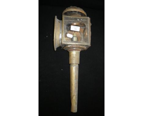 An early 20th century brass carriage lamp