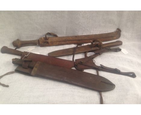 Four similar knives in leather scabbard