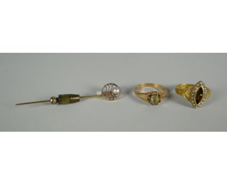 A GOLD &amp; PEARL HAT-PIN &amp; TWO RINGS the pin marked 14k and with two natural pearls, an antique ring marked 15ct (missi