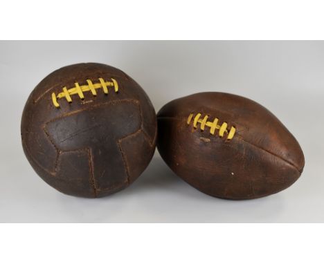 TWO VINTAGE BALLS being a 1940's football together with a circa 1955 rugby ball