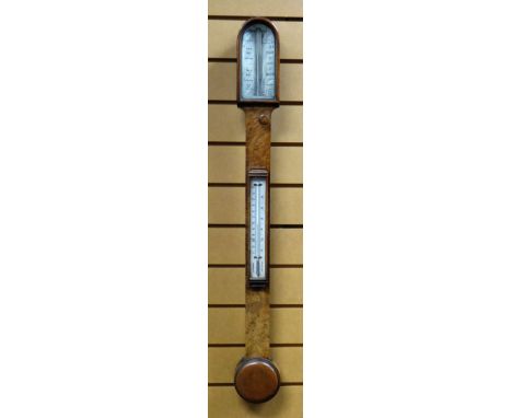 A NINETEENTH CENTURY WALNUT ENCASED STICK BAROMETER by T B Winter of Grey Street, Newcastle-on-Thyme, 91cms highThe barometer