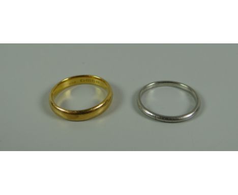 A 22k YELLOW GOLD BAND RING, 5.4gms & a white metal band ring