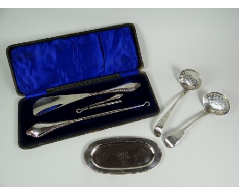 A PARCEL OF SILVER comprising cased set of silver-handled clothing accessories (shoe horn and button hooks), a Georgian silve