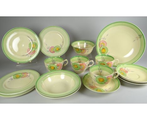 A CLARICE CLIFF PART-TEA SET comprising four cups, sugar basin, two fruit dishes, four saucers, six tea plates & a larger pla