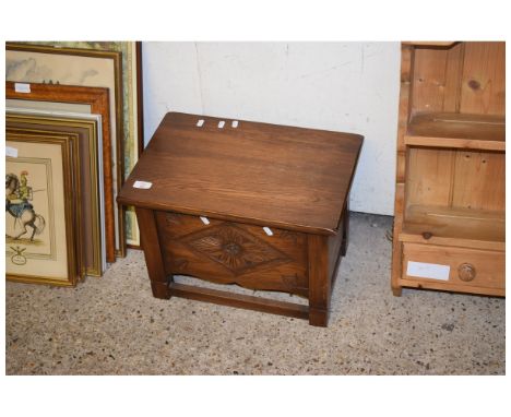 SMALL OAK FRAMED TRUNK WITH CARVED FRONT