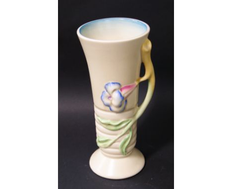Clarice Cliff, a relief decorated floral vase, painted against a salt glaze cream ground and blue tinted interior. 