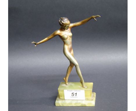 An Art Deco-style silvered bronze figure, raised on a stepped onyx plinth CONDITION REPORT; Surface wear throughout the figur