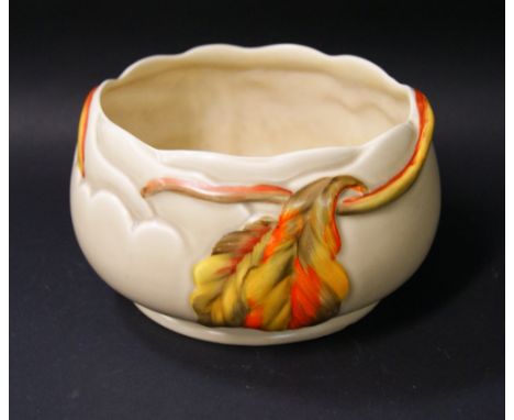 Clarice Cliff, a relief decorated floral bowl, painted against a salt glaze cream ground. 