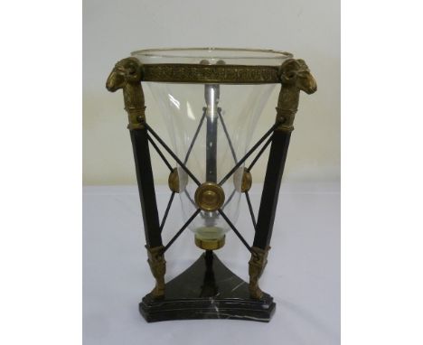 A French Empire style glass lantern with applied gilt mounts on shaped marble base