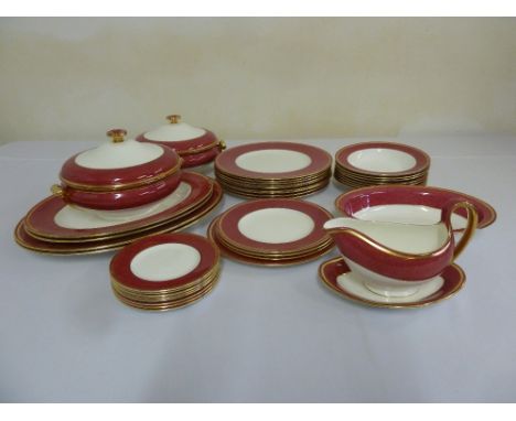 Wedgwood Ruby W32 dinner service to include plates, tureens, platters, gravy boat and stand