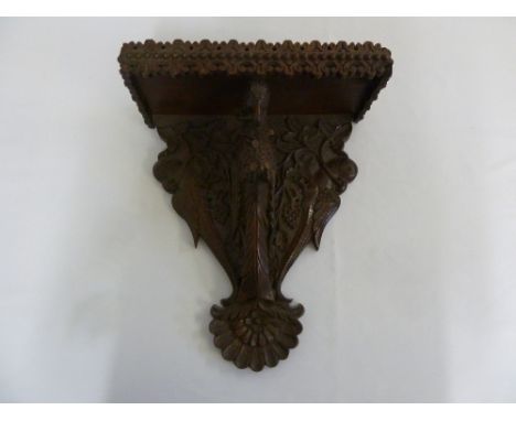 Black Forest wall bracket carved with a bird, leaves and branches A/F