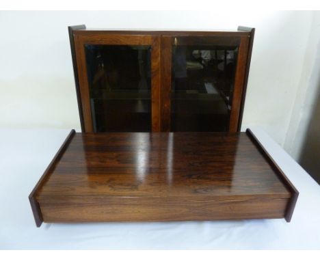 Rosewood hanging wall cabinet with hinged glazed doors above a detachable matching shelf with drawer