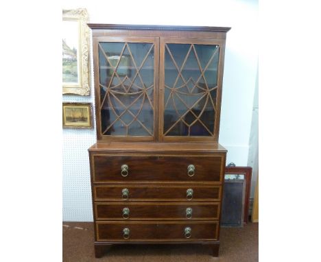 Mahogany bureau breakfront cabinet with glazed top section and four drawers with lion mask ring handles on four bracket feet