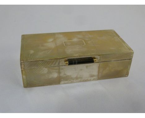 An Art Deco rectangular silver engine turned cigarette box,  with agate handle to hinged cover, London 1932
