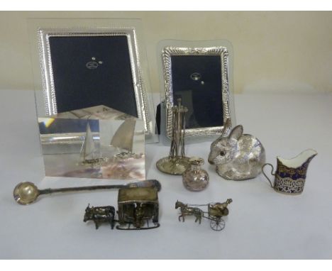A quantity of silver and silver plate to include photograph frames and a punch ladle