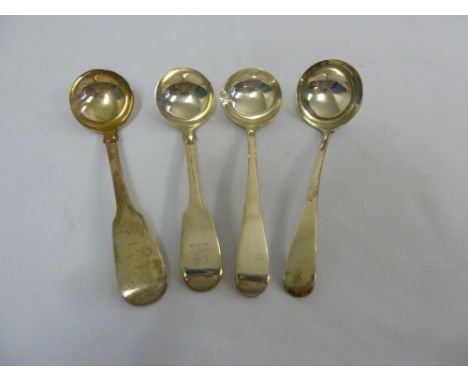 A George III silver Old English pattern cream ladle, a William IV fiddle pattern silver cream ladle, a William IV Old English