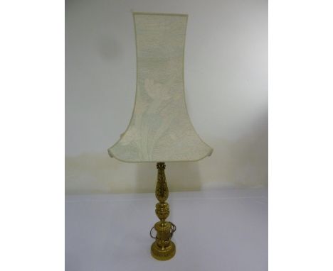 Gilded metal table lamp on raised circular base to include silk shade