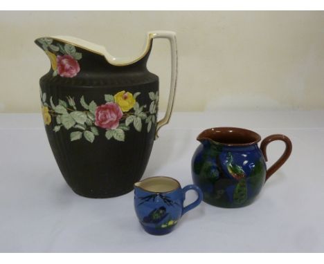 Three decorative ceramic jugs