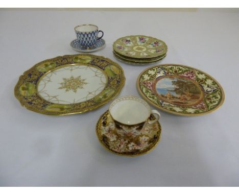 A quantity of decorative porcelain to include a Vienna plate, two cups and saucers and four plates