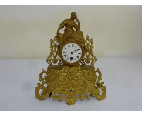 Spelter mantle clock, enamel dial Roman numerals surmounted by a female figure  A/F
