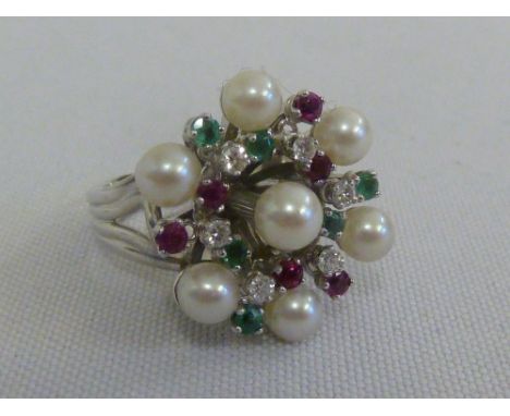 Piaget 18ct white gold pearl, diamond, ruby and emerald ring