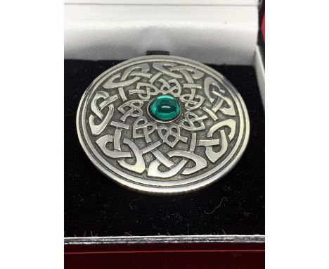 A BOXED CELTIC STYLE PEWTER BROOCH WITH A BLUE STONE 