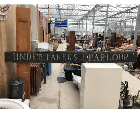 A LARGE WOODEN VINTAGE 'UNDERTAKERS PARLOUR' SIGN, WIDTH 246CM 