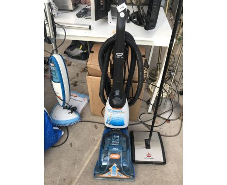 A VAX RAPIDE DELUXE CARPET WASHER AND A BISSELL PERFECT SWEEP 