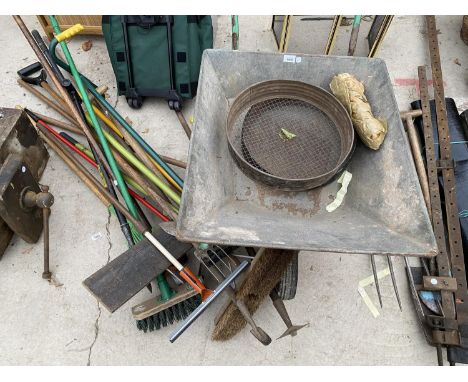 GARDEN TOOLS - A WHEELBARROW, FORKS, RAKES ETC 