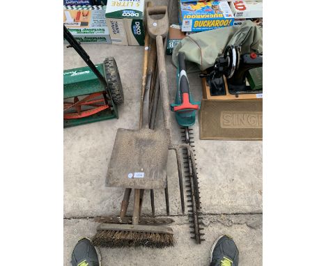 A HEDGE TRIMMER AND VARIOUS GARDEN TOOLS 