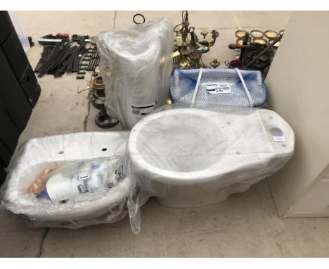 A NEW BATHROOM VANITY SET TO INCLUDE TOILET, CISTERN, WASH BASIN AND PEDESTAL 