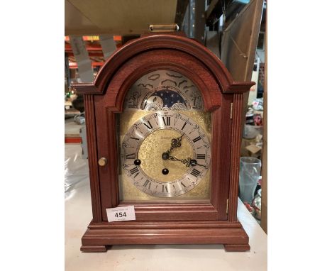 A KIENINGER ROLLING MOON MANTEL CLOCK 
