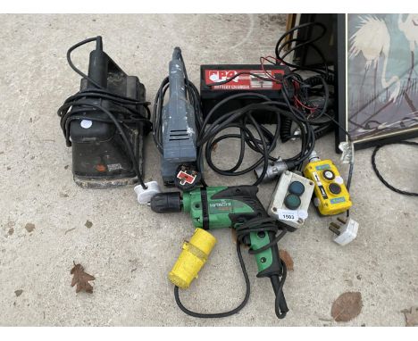 A DRILL, BATTERY CHARGER AND VARIOUS TOOLS 